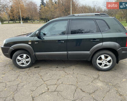 Зеленый Хендай Туксон, объемом двигателя 1.98 л и пробегом 200 тыс. км за 8500 $, фото 8 на Automoto.ua