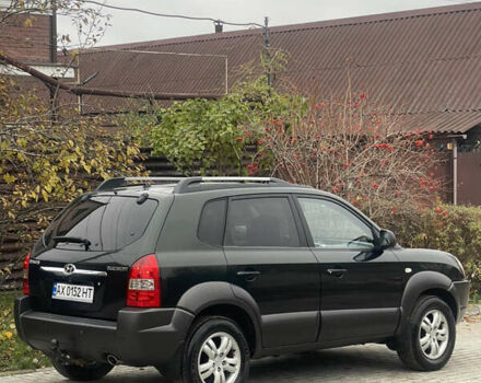 Зеленый Хендай Туксон, объемом двигателя 1.98 л и пробегом 261 тыс. км за 7499 $, фото 45 на Automoto.ua