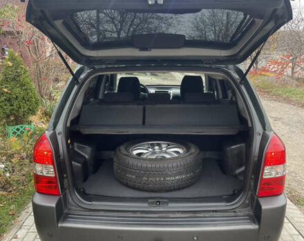 Зеленый Хендай Туксон, объемом двигателя 1.98 л и пробегом 261 тыс. км за 7499 $, фото 123 на Automoto.ua