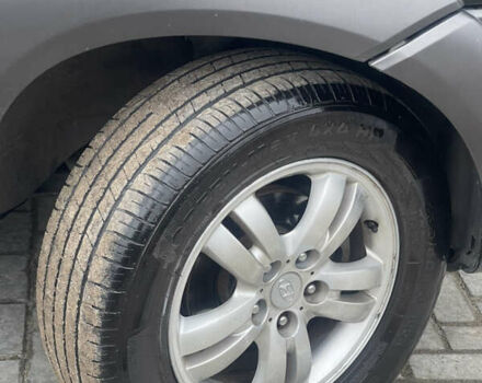 Зеленый Хендай Туксон, объемом двигателя 1.98 л и пробегом 261 тыс. км за 7499 $, фото 54 на Automoto.ua