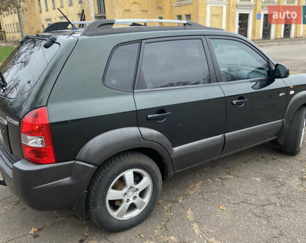 Зеленый Хендай Туксон, объемом двигателя 1.98 л и пробегом 200 тыс. км за 8500 $, фото 6 на Automoto.ua