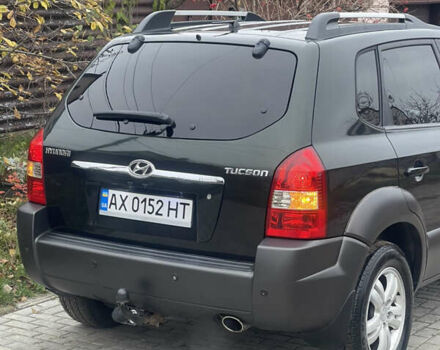 Зеленый Хендай Туксон, объемом двигателя 1.98 л и пробегом 261 тыс. км за 7499 $, фото 23 на Automoto.ua