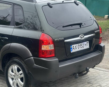 Зеленый Хендай Туксон, объемом двигателя 1.98 л и пробегом 261 тыс. км за 7499 $, фото 27 на Automoto.ua