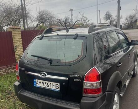 Зеленый Хендай Туксон, объемом двигателя 2 л и пробегом 201 тыс. км за 7600 $, фото 4 на Automoto.ua