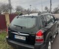 Зеленый Хендай Туксон, объемом двигателя 2 л и пробегом 201 тыс. км за 7600 $, фото 4 на Automoto.ua