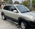 Зеленый Хендай Туксон, объемом двигателя 1.98 л и пробегом 205 тыс. км за 7600 $, фото 1 на Automoto.ua