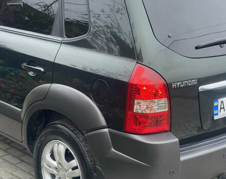 Зеленый Хендай Туксон, объемом двигателя 1.98 л и пробегом 261 тыс. км за 7499 $, фото 26 на Automoto.ua
