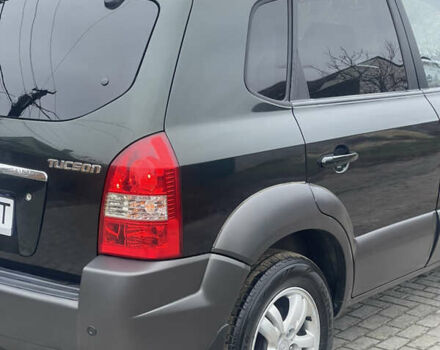 Зеленый Хендай Туксон, объемом двигателя 1.98 л и пробегом 261 тыс. км за 7499 $, фото 25 на Automoto.ua