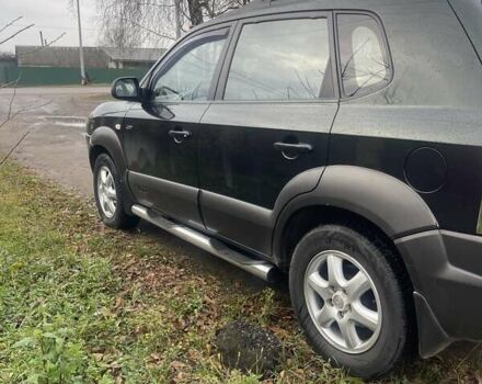 Зеленый Хендай Туксон, объемом двигателя 2 л и пробегом 201 тыс. км за 7600 $, фото 2 на Automoto.ua