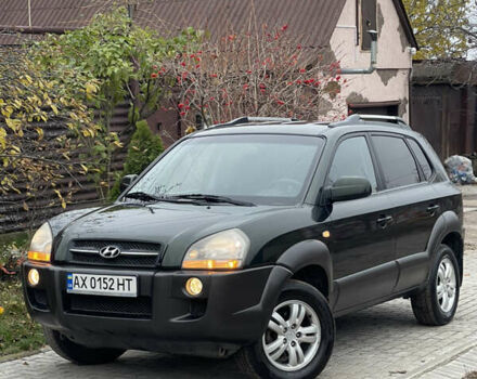Зеленый Хендай Туксон, объемом двигателя 1.98 л и пробегом 261 тыс. км за 7499 $, фото 12 на Automoto.ua
