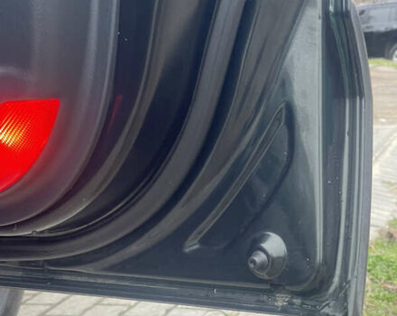 Зеленый Хендай Туксон, объемом двигателя 1.98 л и пробегом 261 тыс. км за 7499 $, фото 75 на Automoto.ua