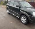 Зеленый Хендай Туксон, объемом двигателя 2 л и пробегом 201 тыс. км за 7600 $, фото 6 на Automoto.ua