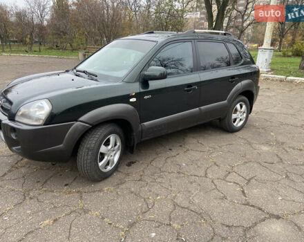 Зеленый Хендай Туксон, объемом двигателя 1.98 л и пробегом 200 тыс. км за 8500 $, фото 4 на Automoto.ua