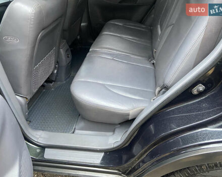 Зеленый Хендай Туксон, объемом двигателя 1.98 л и пробегом 200 тыс. км за 8500 $, фото 16 на Automoto.ua