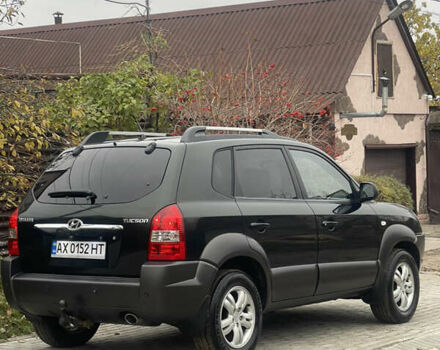 Зеленый Хендай Туксон, объемом двигателя 1.98 л и пробегом 261 тыс. км за 7499 $, фото 46 на Automoto.ua