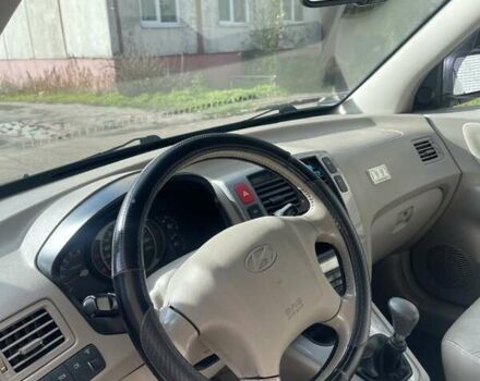 Зеленый Хендай Туксон, объемом двигателя 2 л и пробегом 201 тыс. км за 7600 $, фото 21 на Automoto.ua