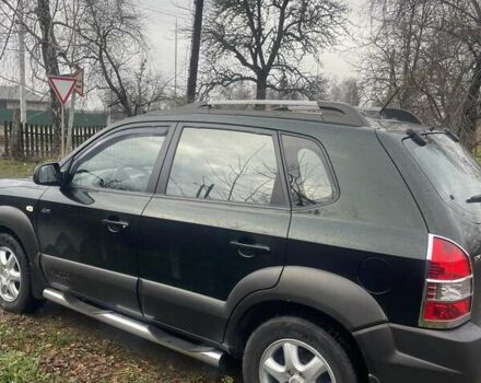 Зеленый Хендай Туксон, объемом двигателя 2 л и пробегом 201 тыс. км за 7600 $, фото 1 на Automoto.ua