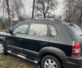 Зеленый Хендай Туксон, объемом двигателя 2 л и пробегом 201 тыс. км за 7600 $, фото 1 на Automoto.ua