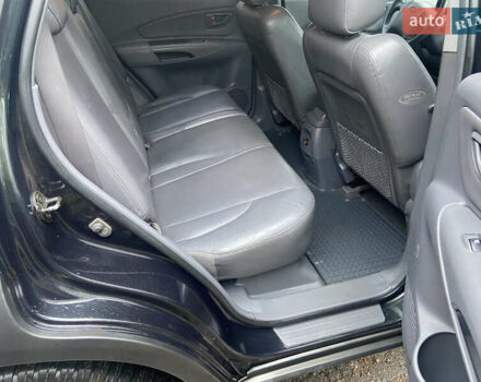 Зеленый Хендай Туксон, объемом двигателя 1.98 л и пробегом 200 тыс. км за 8500 $, фото 18 на Automoto.ua