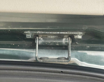 Зеленый Хендай Туксон, объемом двигателя 1.98 л и пробегом 261 тыс. км за 7499 $, фото 68 на Automoto.ua