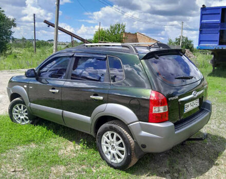 Зеленый Хендай Туксон, объемом двигателя 2 л и пробегом 222 тыс. км за 8800 $, фото 3 на Automoto.ua