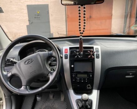 Зеленый Хендай Туксон, объемом двигателя 2 л и пробегом 230 тыс. км за 6950 $, фото 3 на Automoto.ua