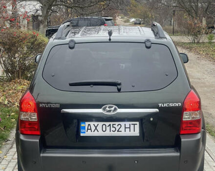 Зеленый Хендай Туксон, объемом двигателя 1.98 л и пробегом 261 тыс. км за 7499 $, фото 51 на Automoto.ua