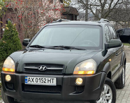 Зеленый Хендай Туксон, объемом двигателя 1.98 л и пробегом 261 тыс. км за 7499 $, фото 1 на Automoto.ua
