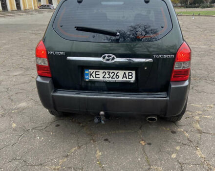 Зеленый Хендай Туксон, объемом двигателя 1.98 л и пробегом 200 тыс. км за 8500 $, фото 2 на Automoto.ua