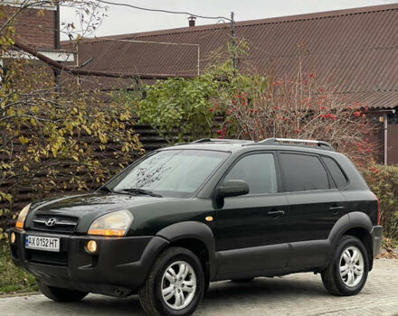 Зеленый Хендай Туксон, объемом двигателя 1.98 л и пробегом 261 тыс. км за 7499 $, фото 16 на Automoto.ua