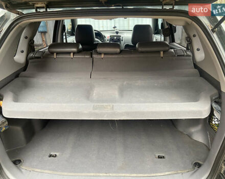 Зеленый Хендай Туксон, объемом двигателя 1.98 л и пробегом 200 тыс. км за 8500 $, фото 21 на Automoto.ua