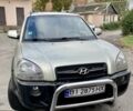Зеленый Хендай Туксон, объемом двигателя 1.98 л и пробегом 205 тыс. км за 7600 $, фото 1 на Automoto.ua