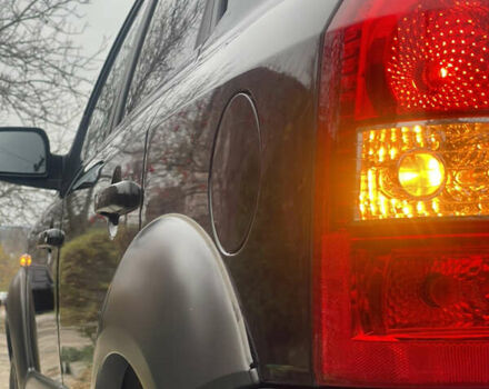 Зеленый Хендай Туксон, объемом двигателя 1.98 л и пробегом 261 тыс. км за 7499 $, фото 34 на Automoto.ua