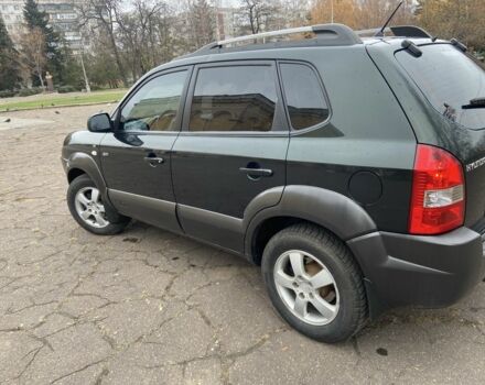 Зеленый Хендай Туксон, объемом двигателя 2 л и пробегом 200 тыс. км за 8500 $, фото 6 на Automoto.ua