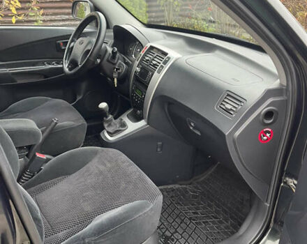 Зеленый Хендай Туксон, объемом двигателя 1.98 л и пробегом 261 тыс. км за 7499 $, фото 134 на Automoto.ua