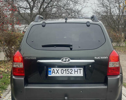 Зеленый Хендай Туксон, объемом двигателя 1.98 л и пробегом 261 тыс. км за 7499 $, фото 50 на Automoto.ua