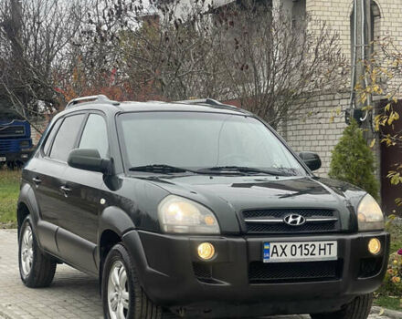 Зеленый Хендай Туксон, объемом двигателя 1.98 л и пробегом 261 тыс. км за 7499 $, фото 7 на Automoto.ua
