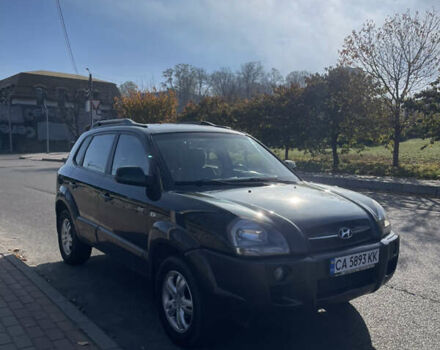Зеленый Хендай Туксон, объемом двигателя 1.99 л и пробегом 208 тыс. км за 7600 $, фото 5 на Automoto.ua