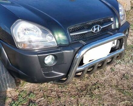 Зелений Хендай Туксон, об'ємом двигуна 2 л та пробігом 137 тис. км за 8500 $, фото 4 на Automoto.ua