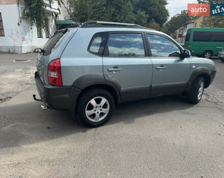 Зелений Хендай Туксон, об'ємом двигуна 1.98 л та пробігом 234 тис. км за 7800 $, фото 5 на Automoto.ua