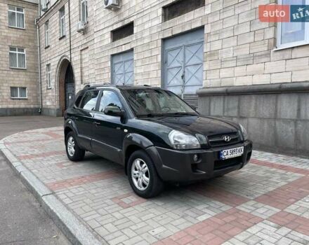 Зелений Хендай Туксон, об'ємом двигуна 2 л та пробігом 211 тис. км за 7400 $, фото 5 на Automoto.ua