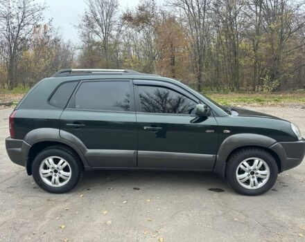 Зеленый Хендай Туксон, объемом двигателя 2.7 л и пробегом 250 тыс. км за 7850 $, фото 6 на Automoto.ua