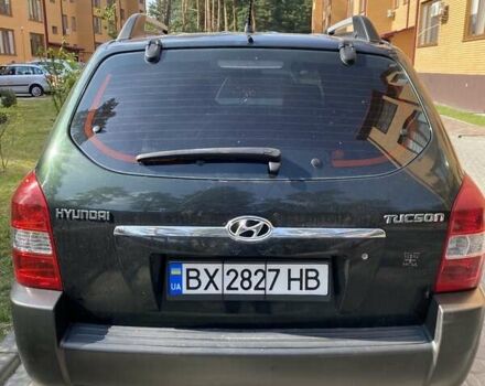 Зелений Хендай Туксон, об'ємом двигуна 1.98 л та пробігом 304 тис. км за 7500 $, фото 4 на Automoto.ua