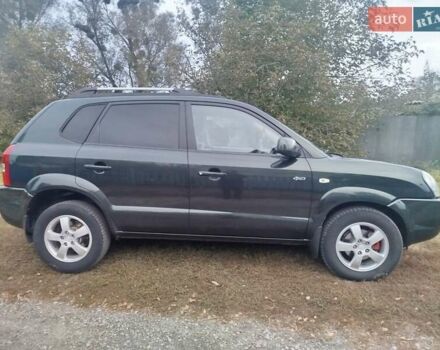 Зеленый Хендай Туксон, объемом двигателя 1.98 л и пробегом 310 тыс. км за 6200 $, фото 9 на Automoto.ua