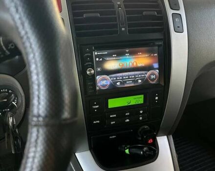 Зелений Хендай Туксон, об'ємом двигуна 1.98 л та пробігом 188 тис. км за 7900 $, фото 10 на Automoto.ua