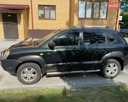 Зелений Хендай Туксон, об'ємом двигуна 1.98 л та пробігом 304 тис. км за 7500 $, фото 3 на Automoto.ua