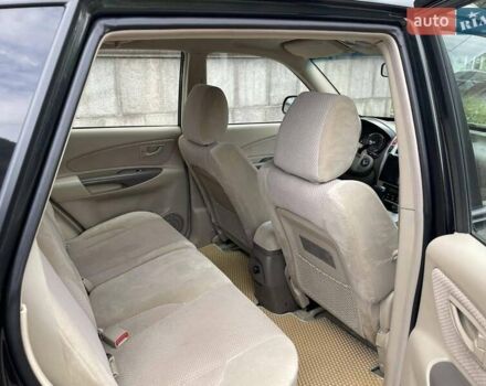 Зелений Хендай Туксон, об'ємом двигуна 2 л та пробігом 211 тис. км за 7400 $, фото 18 на Automoto.ua