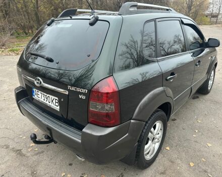 Зеленый Хендай Туксон, объемом двигателя 2.7 л и пробегом 250 тыс. км за 7850 $, фото 5 на Automoto.ua
