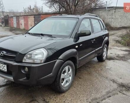 Зеленый Хендай Туксон, объемом двигателя 1.98 л и пробегом 241 тыс. км за 6900 $, фото 1 на Automoto.ua