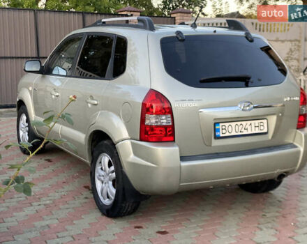 Зелений Хендай Туксон, об'ємом двигуна 1.99 л та пробігом 149 тис. км за 7300 $, фото 5 на Automoto.ua